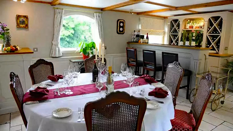 Dining area & bar on French Hotel Barge Renaissance