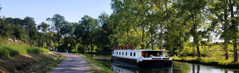 French Hotel Barge Savoir Vivre cruising the Canal de Bourgogne
