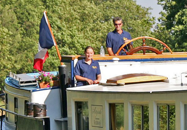Captain & crew guiding Anjodi along the canal du midi