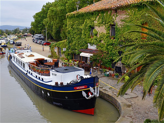 Hotel Barge Anjodi moored at Le Somail in the south of France