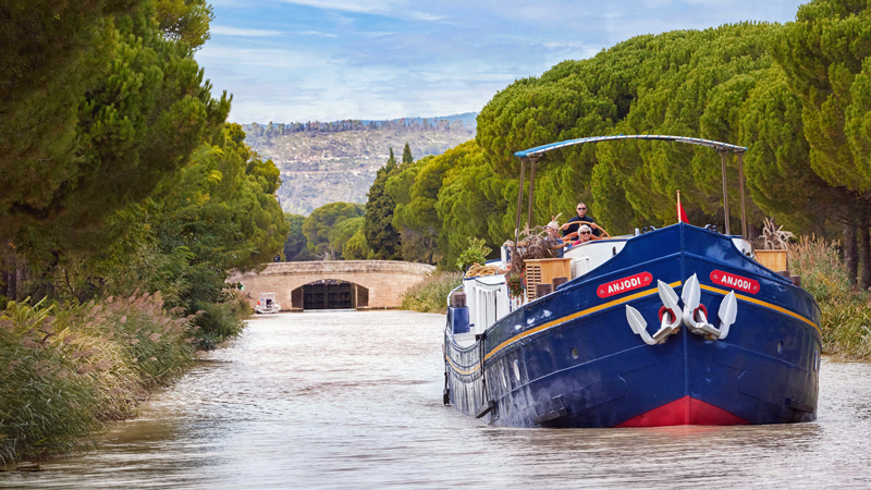Hotel Barge Anjodi cruising the Canal du Midi on yet another beautiful day