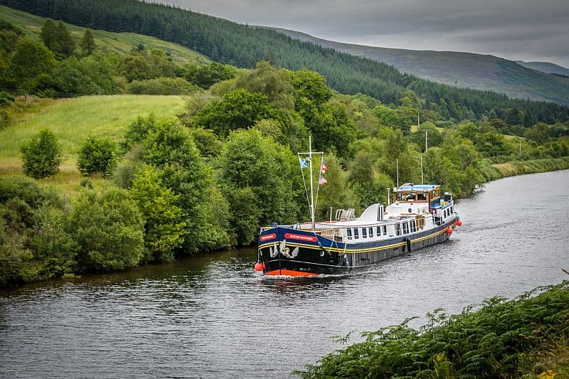Scottish Hotel Barge Scottish Highlander cruising in the majestic highlands of Scotland